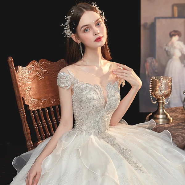 Luxe Champagne La Mariée Robe De Mariée 2020 Robe Boule Transparentes Encolure Dégagée Manches Courtes Dos Nu Glitter Tulle Paillettes Perlage Cathedral Train Volants