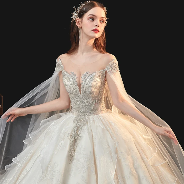 Luxe Champagne La Mariée Robe De Mariée 2020 Robe Boule Transparentes Encolure Dégagée Manches Courtes Dos Nu Glitter Tulle Paillettes Perlage Cathedral Train Volants