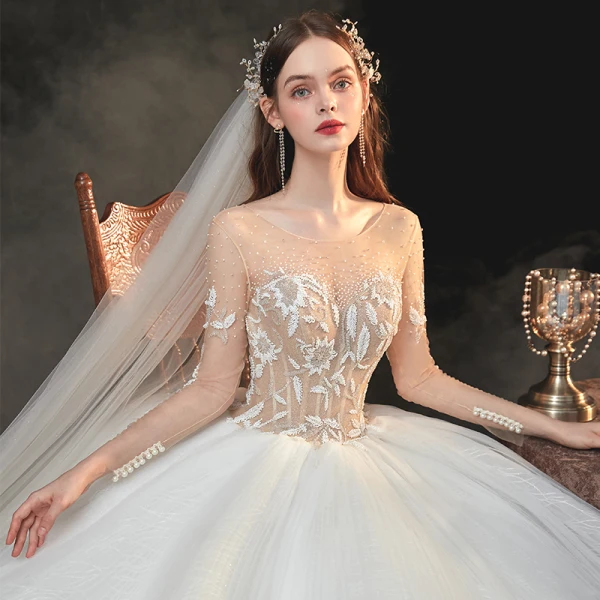 Fabuleux Champagne La Mariée Robe De Mariée 2020 Robe Boule Transparentes Encolure Carrée Manches Longues Dos Nu Fait main Perlage Perle Glitter Tulle Cathedral Train Volants