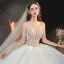 Fabuleux Champagne La Mariée Robe De Mariée 2020 Robe Boule Transparentes Encolure Carrée Manches Longues Dos Nu Fait main Perlage Perle Glitter Tulle Cathedral Train Volants