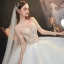 Fabuleux Champagne La Mariée Robe De Mariée 2020 Robe Boule Transparentes Encolure Carrée Manches Longues Dos Nu Fait main Perlage Perle Glitter Tulle Cathedral Train Volants