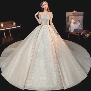 Vintage Retro Champagne Bridal Wedding Dresses 2020 Ball Gown See Through Scoop Neck Short Sleeve Backless Handmade Beading Sequins Cathedral Train Ruffle