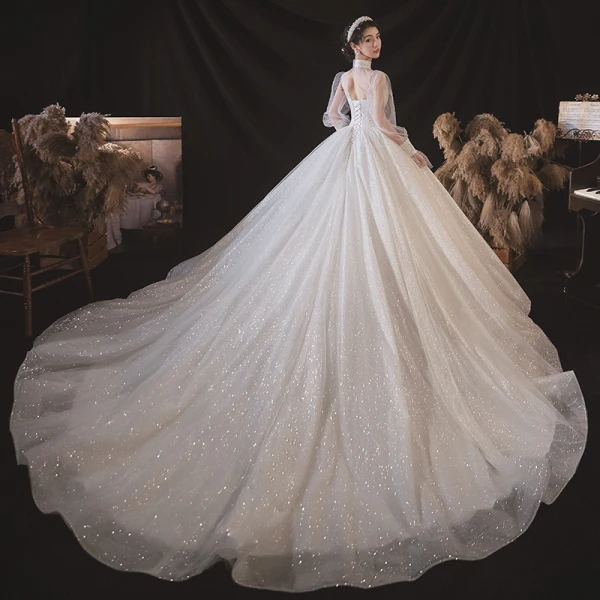 Style Victorien Blanche La Mariée Robe De Mariée 2020 Robe Boule Transparentes Col Haut Gonflée Manches Longues Dos Nu Perlage Glitter Tulle Cathedral Train Volants