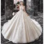 Vintage / Originale Champagne La Mariée Robe De Mariée 2020 Robe Boule Transparentes Col Haut Manches Courtes Perlage Gland Dos Nu Appliques En Dentelle Cathedral Train Volants
