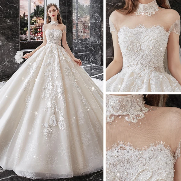 Vintage / Originale Champagne La Mariée Robe De Mariée 2020 Robe Boule Transparentes Col Haut Manches Courtes Perlage Gland Dos Nu Appliques En Dentelle Cathedral Train Volants