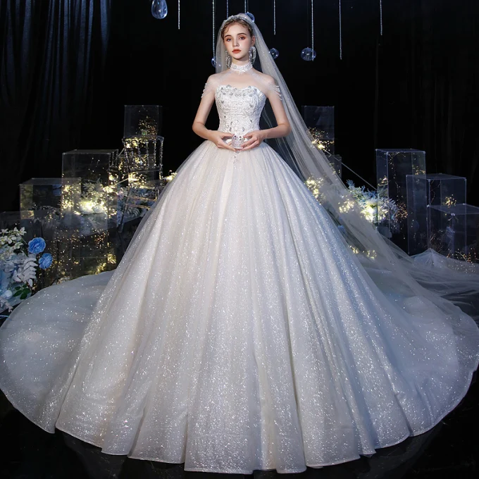 Roman Hvit Bryllups Brudekjoler 2020 Ballkjole Kjæreste Uten Ermer Appliques Blonder Ryggløse Glitter Tyll Paljetter Beading Cathedral Train Buste