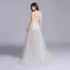 Sexy Champagne Robe De Bal 2020 Princesse Bretelles Spaghetti Col v profond Sans Manches Appliques En Dentelle Fendue devant Tribunal Train Volants Dos Nu Robe De Ceremonie