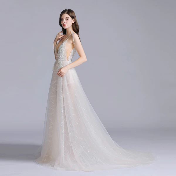 Sexy Champagne Robe De Bal 2020 Princesse Bretelles Spaghetti Col v profond Sans Manches Appliques En Dentelle Fendue devant Tribunal Train Volants Dos Nu Robe De Ceremonie