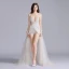 Sexy Champagne Robe De Bal 2020 Princesse Bretelles Spaghetti Col v profond Sans Manches Appliques En Dentelle Fendue devant Tribunal Train Volants Dos Nu Robe De Ceremonie