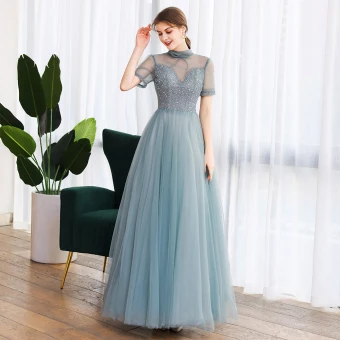 Vintage Originale Vert Dansant Robe De Bal 2020 Princesse Transparentes Col Haut Sans Manches Perlage Longue Volants Dos Nu Robe De Ceremonie