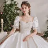 Stunning Ivory Satin Bridal Wedding Dresses 2020 Ball Gown Square Neckline Puffy Short Sleeve Backless Beading Cathedral Train Ruffle