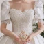 Atemberaubend Ivory / Creme Satin Hochzeits Brautkleider / Hochzeitskleider 2020 Ballkleid Eckiger Ausschnitt Geschwollenes Kurze Ärmel Rückenfreies Perlenstickerei Kathedrale Schleppe Rüschen