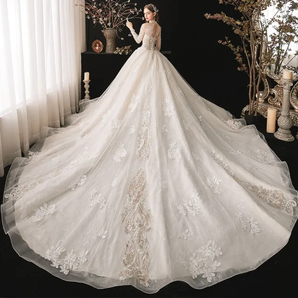Vintage / Retro Ivory Bridal Wedding Dresses 2020 Ball Gown See-through High Neck Long Sleeve Backless Appliques Lace Beading Cathedral Train Ruffle