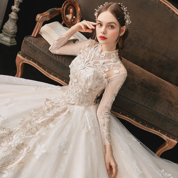 Vintage / Retro Ivory Bridal Wedding Dresses 2020 Ball Gown See-through High Neck Long Sleeve Backless Appliques Lace Beading Cathedral Train Ruffle