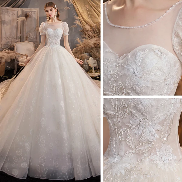 Style Victorien Ivoire La Mariée Robe De Mariée 2020 Robe Boule Transparentes Encolure Dégagée Gonflée Manches Courtes Dos Nu Paillettes Perlage Glitter Tulle Cathedral Train Volants