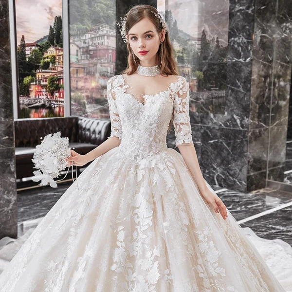 Vintage / Retro Champagne Bridal Wedding Dresses 2020 Ball Gown See-through High Neck 1/2 Sleeves Backless Appliques Lace Beading Cathedral Train Ruffle