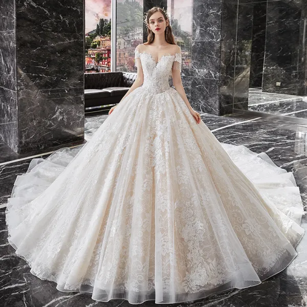 Charming Champagne Bridal Wedding Dresses 2020 Ball Gown See-through Scoop Neck Short Sleeve Beading Tassel Backless Appliques Lace Cathedral Train Ruffle