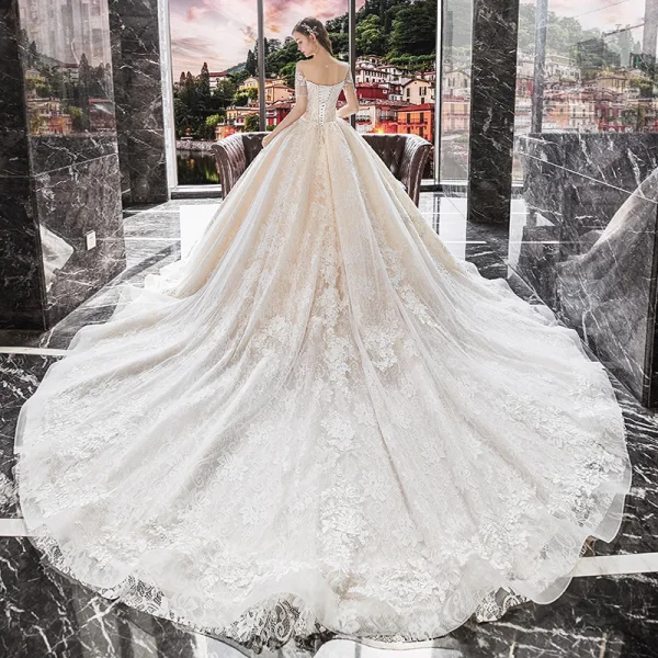 Charming Champagne Bridal Wedding Dresses 2020 Ball Gown See-through Scoop Neck Short Sleeve Beading Tassel Backless Appliques Lace Cathedral Train Ruffle