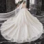 Meilleur Champagne La Mariée Robe De Mariée 2020 Robe Boule Transparentes Encolure Dégagée Manches Longues Dos Nu Paillettes Perlage Glitter Tulle Cathedral Train Volants
