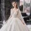 Meilleur Champagne La Mariée Robe De Mariée 2020 Robe Boule Transparentes Encolure Dégagée Manches Longues Dos Nu Paillettes Perlage Glitter Tulle Cathedral Train Volants
