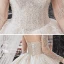 Meilleur Champagne La Mariée Robe De Mariée 2020 Robe Boule Transparentes Encolure Dégagée Manches Longues Dos Nu Paillettes Perlage Glitter Tulle Cathedral Train Volants
