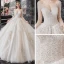Meilleur Champagne La Mariée Robe De Mariée 2020 Robe Boule Transparentes Encolure Dégagée Manches Longues Dos Nu Paillettes Perlage Glitter Tulle Cathedral Train Volants