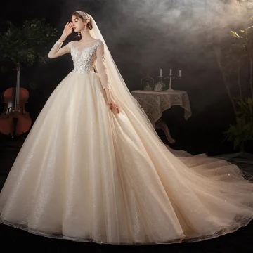 Charmig Champagne Brud Bröllopsklänningar 2020 Balklänning Genomskinliga Urringning Långärmad Appliqués Spets Paljetter Beading Glittriga Glitter Tyll Cathedral Train Ruffle