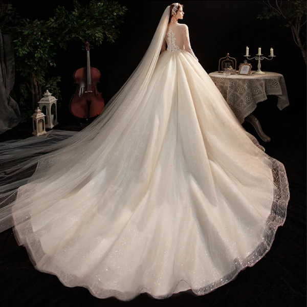 Charming Champagne Bridal Wedding Dresses 2020 Ball Gown See-through Scoop Neck Long Sleeve Appliques Lace Sequins Beading Glitter Tulle Cathedral Train Ruffle
