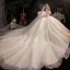 Charming Champagne Bridal Wedding Dresses 2020 Ball Gown See-through Scoop Neck Long Sleeve Appliques Lace Sequins Beading Glitter Tulle Cathedral Train Ruffle