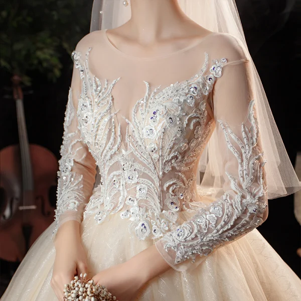 Charming Champagne Bridal Wedding Dresses 2020 Ball Gown See-through Scoop Neck Long Sleeve Appliques Lace Sequins Beading Glitter Tulle Cathedral Train Ruffle