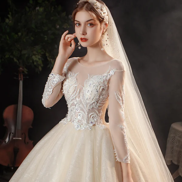 Charming Champagne Bridal Wedding Dresses 2020 Ball Gown See-through Scoop Neck Long Sleeve Appliques Lace Sequins Beading Glitter Tulle Cathedral Train Ruffle