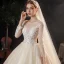 Charming Champagne Bridal Wedding Dresses 2020 Ball Gown See-through Scoop Neck Long Sleeve Appliques Lace Sequins Beading Glitter Tulle Cathedral Train Ruffle