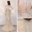 Luxe Doré Transparentes Robe De Soirée 2020 Trompette / Sirène Encolure Dégagée Manches Courtes Perlage Plumes Fendue devant Train De Balayage Robe De Ceremonie