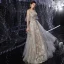 Illusion Gris Robe De Soirée 2020 Princesse Transparentes Encolure Dégagée Manches Courtes Perlage Paillettes Longue Volants Dos Nu Robe De Ceremonie
