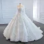 Luxe Blanche Transparentes La Mariée Robe De Mariée 2020 Robe Boule Encolure Dégagée Manches Longues Dos Nu Appliques Fleur Fait main Perlage Train De Balayage Volants