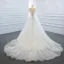 Luxe Blanche La Mariée Robe De Mariée 2020 Robe Boule Transparentes Encolure Dégagée Manches Longues Dos Nu Appliques En Dentelle Fait main Perlage Détachable Chapel Train