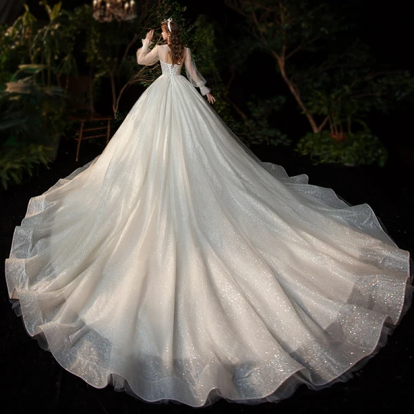 Victorian Style Champagne See-through Bridal Wedding Dresses 2020 Ball Gown Scoop Neck Puffy Long Sleeve Backless Appliques Lace Sequins Beading Glitter Tulle Cathedral Train Ruffle