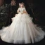 Style Victorien Champagne La Mariée Robe De Mariée 2020 Robe Boule Transparentes Encolure Dégagée Gonflée 1/2 Manches Dos Nu Perlage Glitter Tulle Cathedral Train Volants