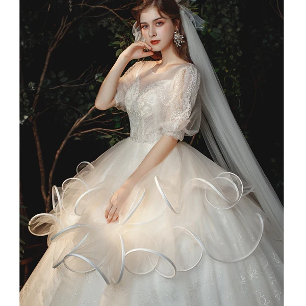Style Victorien Champagne La Mariée Robe De Mariée 2020 Robe Boule Transparentes Encolure Dégagée Gonflée 1/2 Manches Dos Nu Perlage Glitter Tulle Cathedral Train Volants
