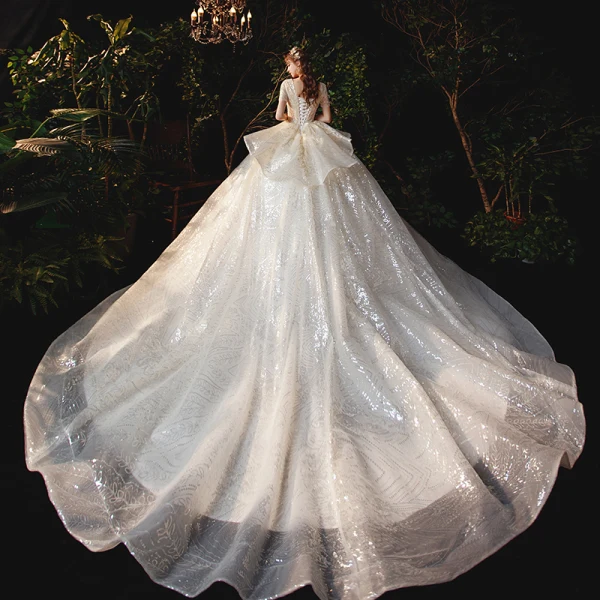 Sparkly Champagne Bridal Wedding Dresses 2020 Ball Gown V-Neck Short Sleeve Backless Appliques Sequins Cathedral Train Ruffle