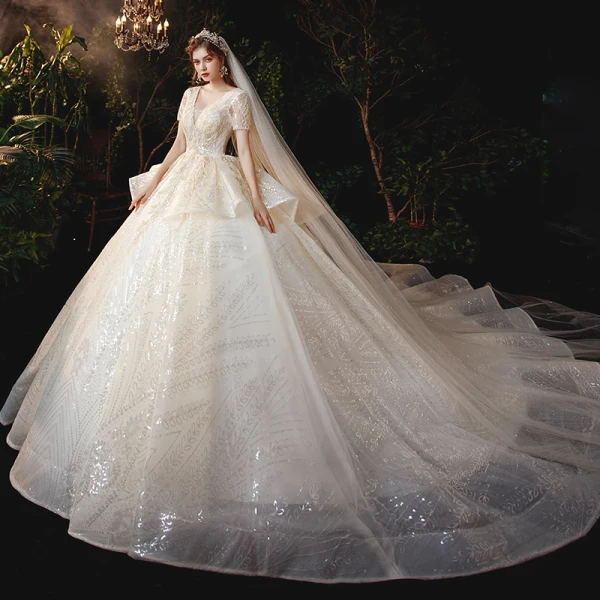 Sparkly Champagne Bridal Wedding Dresses 2020 Ball Gown V-Neck Short Sleeve Backless Appliques Sequins Cathedral Train Ruffle