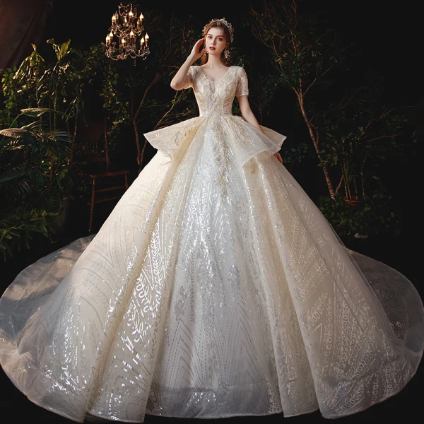 Sparkly Champagne Bridal Wedding Dresses 2020 Ball Gown V-Neck Short Sleeve Backless Appliques Sequins Cathedral Train Ruffle