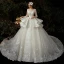 Illusion Champagne Transparentes La Mariée Robe De Mariée 2020 Robe Boule Encolure Dégagée 3/4 Manches Appliques En Dentelle Perlage Glitter Tulle Dos Nu Cathedral Train Volants