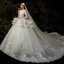 Illusion Champagne Transparentes La Mariée Robe De Mariée 2020 Robe Boule Encolure Dégagée 3/4 Manches Appliques En Dentelle Perlage Glitter Tulle Dos Nu Cathedral Train Volants