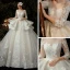 Illusion Champagne Transparentes La Mariée Robe De Mariée 2020 Robe Boule Encolure Dégagée 3/4 Manches Appliques En Dentelle Perlage Glitter Tulle Dos Nu Cathedral Train Volants