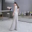 Sparkly Sølv Paljetter Jumpsuit  2020 V-Hals Uten Ermer Lange Ryggløse Formelle Kjoler