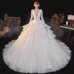 Espejismo Champán Boda Vestidos De Novia 2020 Ball Gown Transparentes V Cuello Profundo Manga Larga Sin Espalda Apliques Con Encaje Rebordear Bowknot Cinturón Glitter Tul Cathedral Train Ruffle