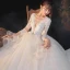 Illusion Champagne La Mariée Robe De Mariée 2020 Robe Boule Transparentes Col v profond Manches Longues Dos Nu Appliques En Dentelle Perlage Noeud Ceinture Glitter Tulle Cathedral Train Volants