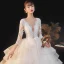Illusion Champagne La Mariée Robe De Mariée 2020 Robe Boule Transparentes Col v profond Manches Longues Dos Nu Appliques En Dentelle Perlage Noeud Ceinture Glitter Tulle Cathedral Train Volants
