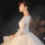 Illusion Champagne La Mariée Robe De Mariée 2020 Robe Boule Transparentes Col v profond Manches Longues Dos Nu Appliques En Dentelle Perlage Noeud Ceinture Glitter Tulle Cathedral Train Volants